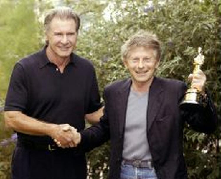 Harrison Ford havde taget en Oscar med til Roman Polanski. - Foto: AP 
