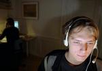 Tal i telefon via pc'en. Nemt og gratis, hvis bredbåndet i forvejen er i hus. - Foto: Ricky John Molloy. 