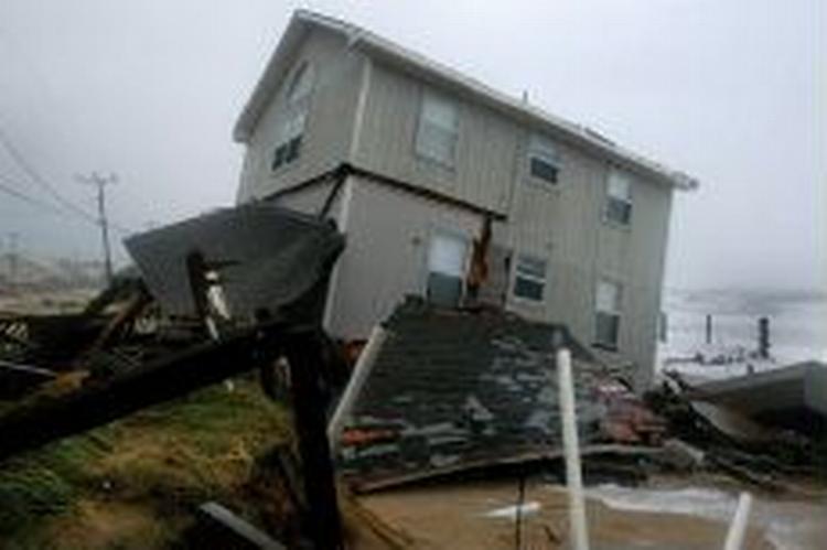Flere steder på den amerikanske østkyst er huse blevet ødelagt. - Foto: AP 