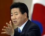 Præsident Roh Moo-hyun risikerer folkelig modstand mod bidrag til USA's koalition i Irak. - Foto: AP 