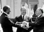 Anwar Sadat, USA's præsident Jimmy Carter og Israels premierminister Begin ved freden i 1979. - Foto: AP 