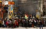 Demonstranter protesterer i Bolivias hovedstad La Paz. - Foto: AP 
