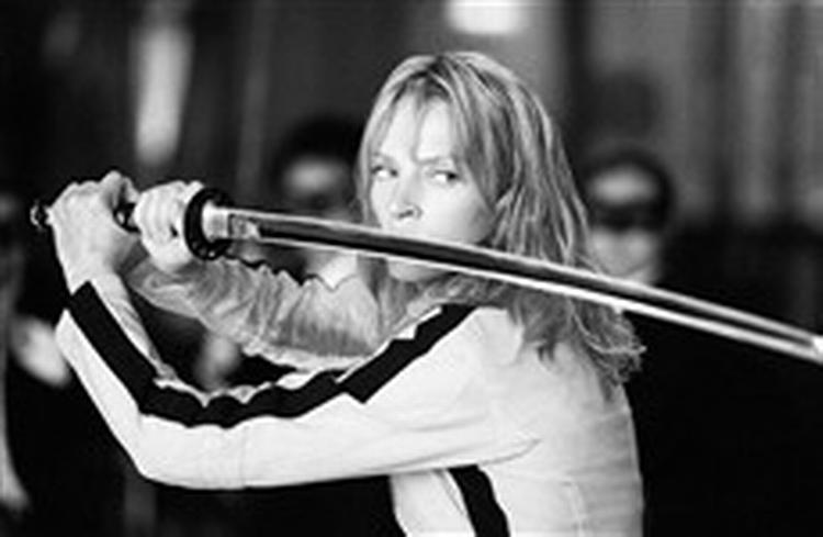 Den eneste synlige essens i 'Kill Bill' er den glæde ved stil. Her Uma Thurman som bruden, der før sit blodige bryllup hed Black Mamba. - Foto: Constantin Film. 