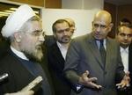 Irans nationale sikkerhedschef, Hasan Rowhani sammen med IAEA's generalsekretær, Mohamed ElBaradei. - Foto: AP 