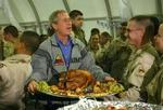 Bush er den første amerikanske præsident, der har besøgt Irak. - Foto: AP 