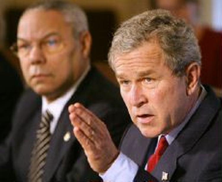 »Soldater fra koalitonslandene risikerede liv. Det kommer kontrakterne til at afspejle«, siger Bush. - Foto: AP 