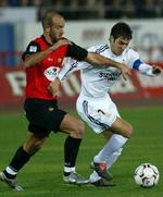 Raul (th) udlignede på et hovedstød i første halvlegs overtid. - Foto: AP 