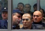 Zvezdan Jovanovic (forrest) menes at have været en af muligvis flere skytter, der affyrede skud mod Djindjic. - Foto: AP 