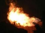 Flammerne fra naturgasfeltet i den sydvestlige provins. - Foto: AP 