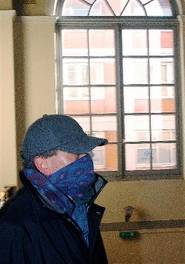 Den tidligere finansdirektør Fausto Tonna ankommer til retten i Parma. - Foto: AP 