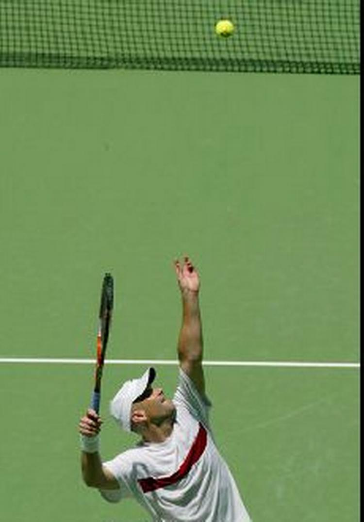 André Agassi slog tjekken Tomas Berdych i tre hurtige sæt - 6-0, 6-2, 6-4. - Foto: AP 