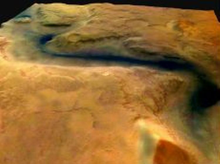 En amerikansk satellit gav allerede i 2001 kraftige indicier for tilstedeværelsen af is på planeten, lyder meldingen fra NASA. - Foto: AP 