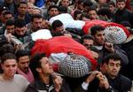 Palæstinensisk sørgeoptog i Gaza efter drabene på de to mænd. - Foto: AP 
