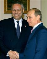Powell og Putin mødtes mandag. - Foto: AP 