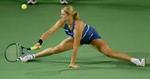 Kim Clijsters har problemer med en mindre ankelskade, men vandt en sikker sejr i semifinalen. - Foto: AP 
