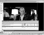 I baggrunden skåler Bill Murray i  Lost in Translations , mens listen over downloads, der er i gang, ses foran. 