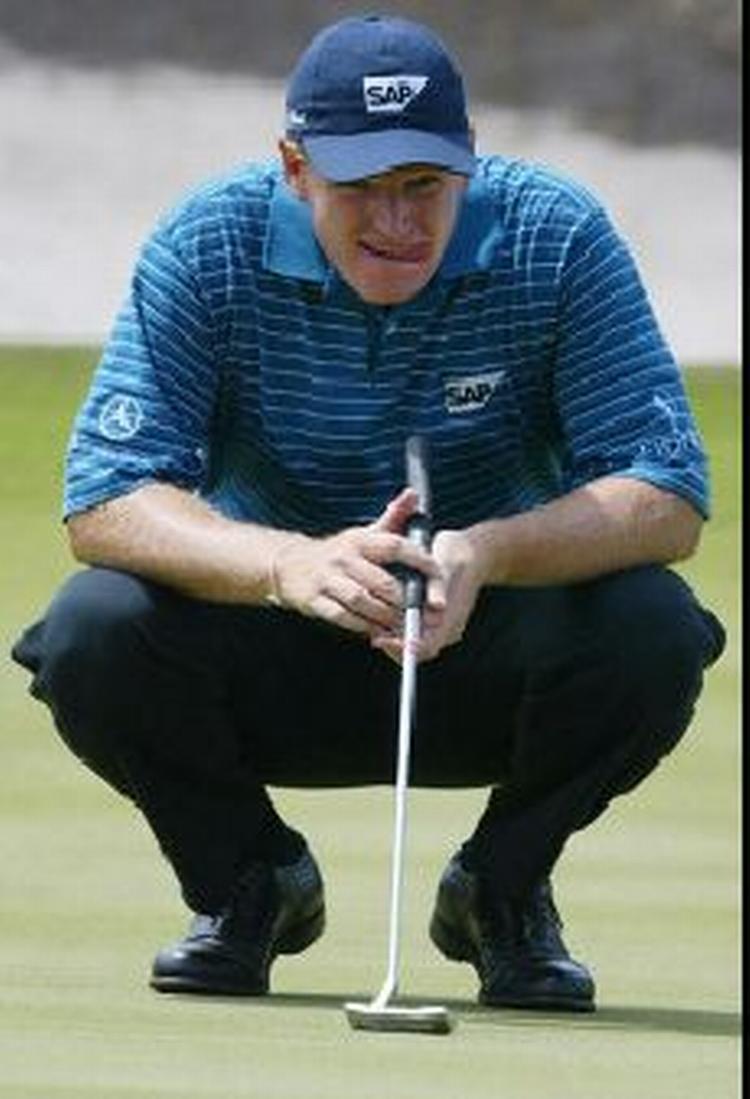 Ernie Els kan roligt slikke sig veltilfreds om munden. Han fører med syv slag. - Foto: AP 
