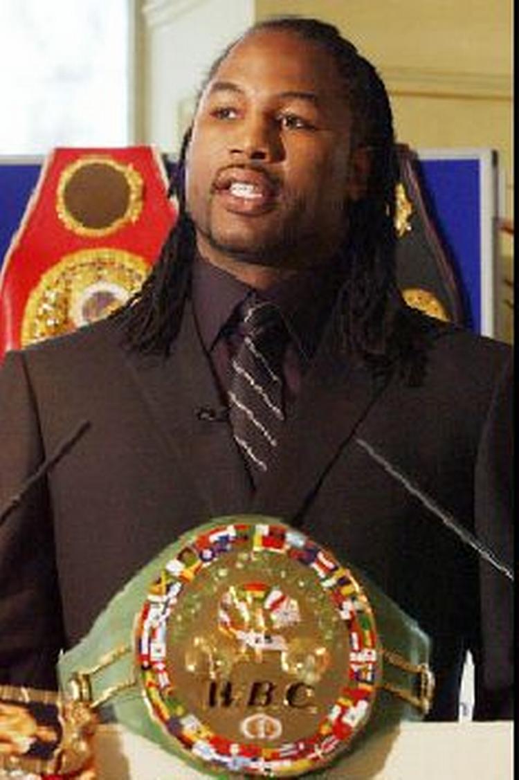 Lennox Lewis stopper. - Foto: AP 