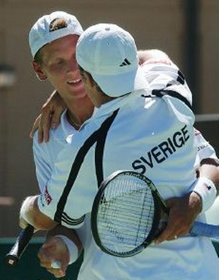 Joachim Johansson og Jonas Björkman. - Foto: AP 