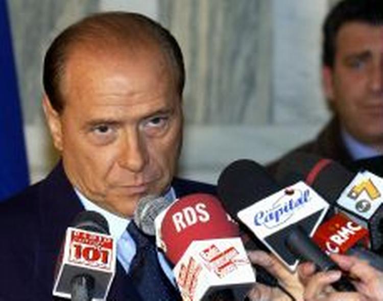 Silvio Berlusconi har for let spil over for de italienske journalister. - Foto: AP 