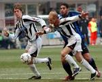 Per Krøldrup, tv, og Udinese slog Inter 2-1. - Foto: AP 