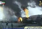 Brandfolk var i færd med at slukke brandene i de afsporede togvogne, da eksplosionen fandt sted. - Foto: AP 