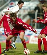 René Henriksen roser sin afløser, Per Krøldrup, for at virke 'dejlig kølig' i omgangen med bolden. - Foto: AP 