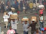 Der var fredag aften talrige rapporter om drab og plyndringer i hovedstaden Port-au-Prince. Oprørerne har taget opstilling umiddelbart udenfor byen og truer med at angribe. - Foto: AP 