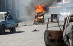 Hovedstaden Port au Prince har i de seneste dage været forvandlet til en krigszone. Nu er der håb om mere fred. - Foto: AP 