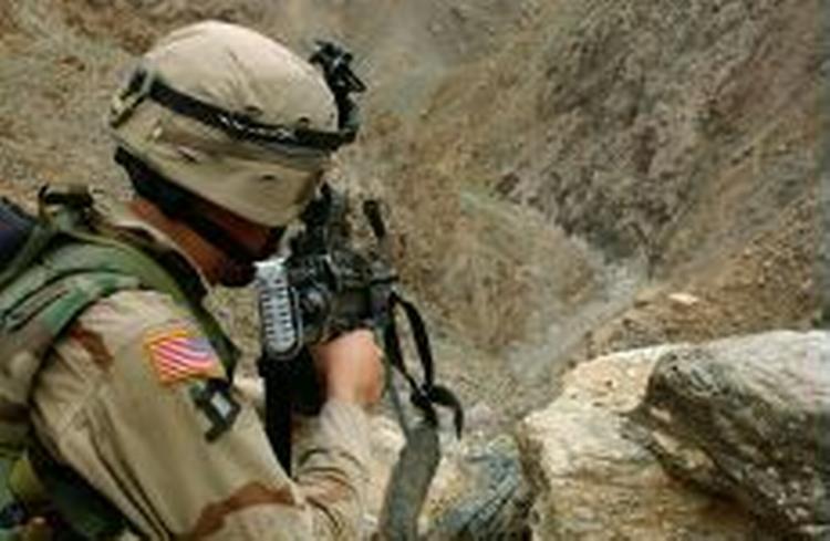 De amerikanske soldater blander sig i almindelige politiopgaver, mener Human Rights Watch. - Arkivfoto: AP 