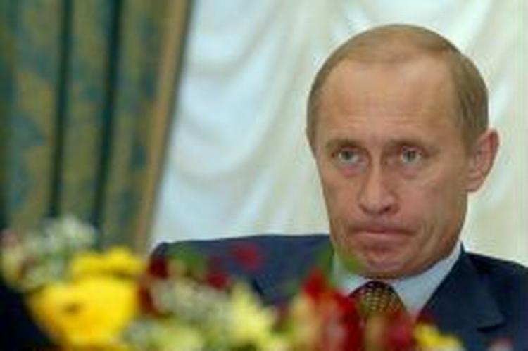 En forsker i Moskva konstaterer, at præsident Putin her få dage før valget har opnået absolut magt over det russiske rige. - Foto: AP 