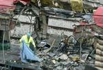 En 45-årig kvinde blev dødsoffer nummer 201 efter tragedien i Madrid. - Foto: AP 