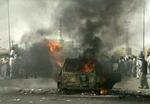 Billederne af angrebet på de fire amerikanske sikkerhedsvagter har spredt rædsel, og amerikanerne har lovet hævn. - Foto: Ap 