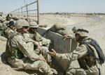 Amerikanske soldater i kamp i udkanten af Fallujah. - Foto: AP 