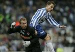 Stokholm (stribet) kunne lige så vel som FCK's Røll få en plads i EM-truppen, mener OB's Jacob Gregersen. FCM's Frank Kristensen bliver her holdt nede. - Foto: Kim Nielsen 