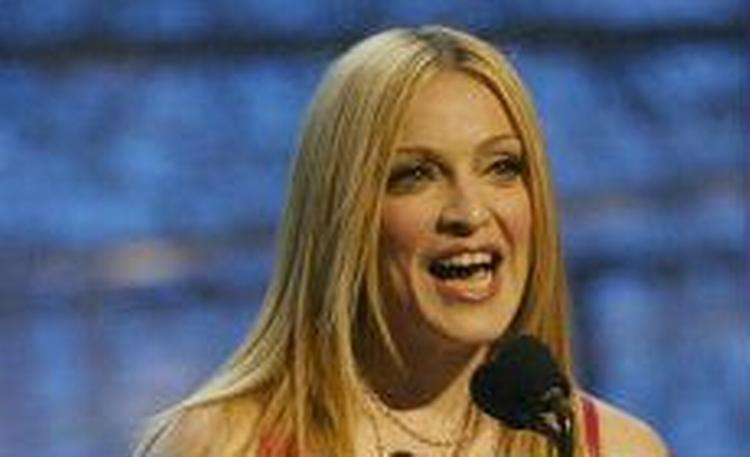 Madonna er viklet ind i et større juridisk slagsmål med Warner Music. - Foto: AP 