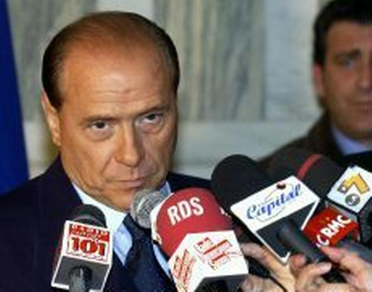 Silvio Berlusconi ejer et stort medieimperium. - Foto: AP 