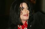 Michael Jackson afviser alle beskyldninger som »en stor løgn« og ventes at erklære sig uskyldig. - Foto: AP 