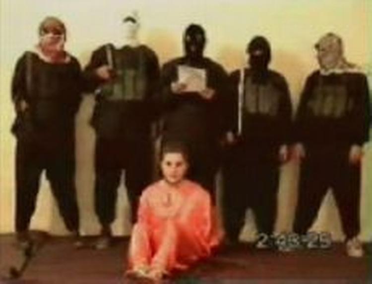 De militante islamister hævdede inden henrettelsen, at de forgæves havde forsøgt at bytte deres gidsel med irakiske fanger. - Foto: AP 