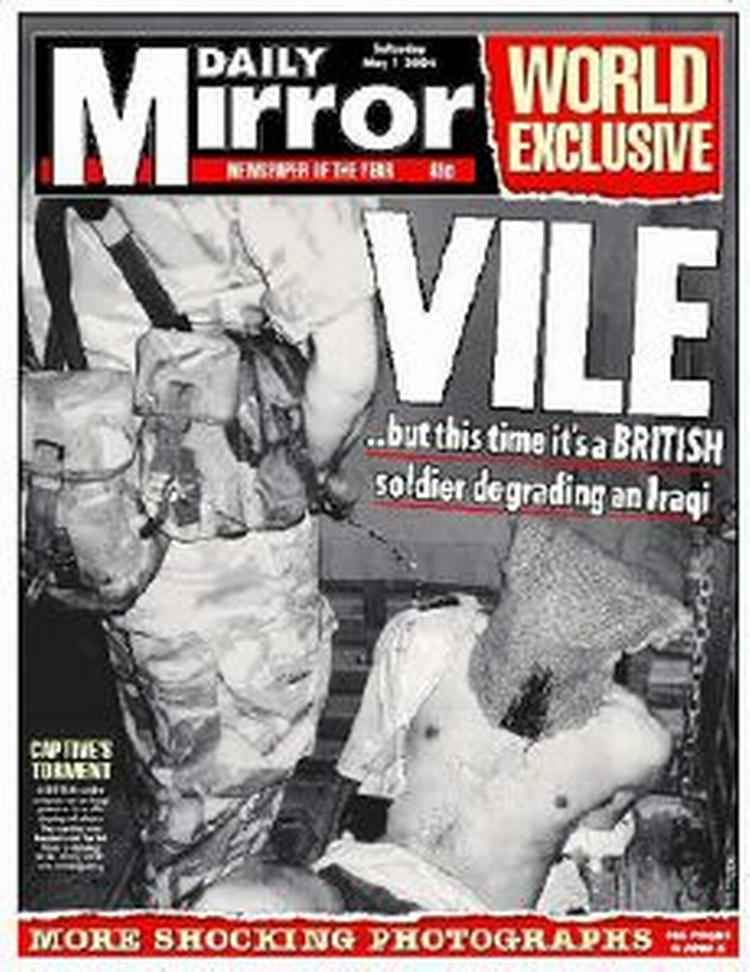 Er dette billede falsk eller ægte? Det står striden i Storbritannien om. - Foto: AP 