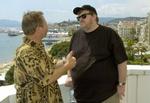 Instruktør Michael Moore interviewes. - Foto: AP 