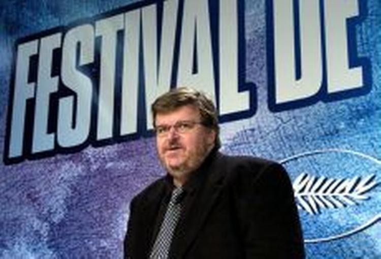 Filmmageren, Michael Moore, har fået maksimal presseopmærksomhed på lanceringen af sin nye film til Cannes-festivalen. - Foto: AP 