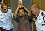 Barghoouti ankommer til retssalen i Tel Aviv. - Foto: AP 