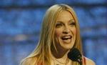 Showet starter med, at Madonna bliver ristet i den elektriske stol. - Foto: AP 