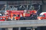 Brandbiler ankom hurtigt til Charles de Gaulle-lufthavnen. - Foto: AP 