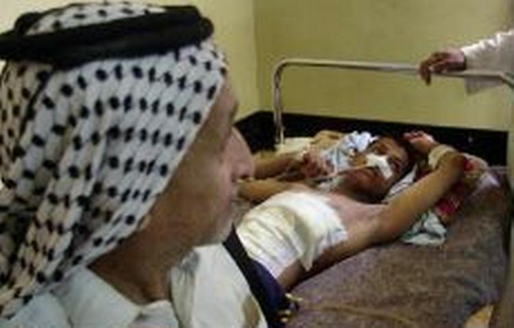 Mange af de sårede på hospitalet i Najaf er civile. - Foto: AP 