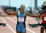 Marion Jones vandt i tiden 10,99 sekunder. - Foto: AP 