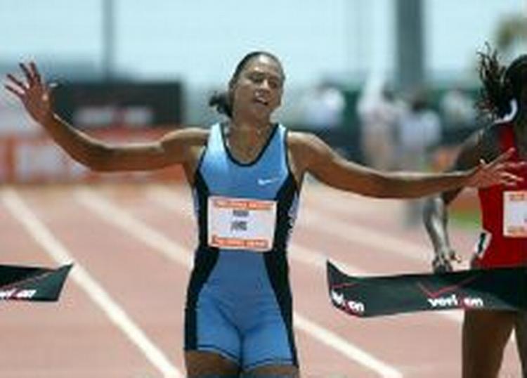 Marion Jones vandt i tiden 10,99 sekunder. - Foto: AP 