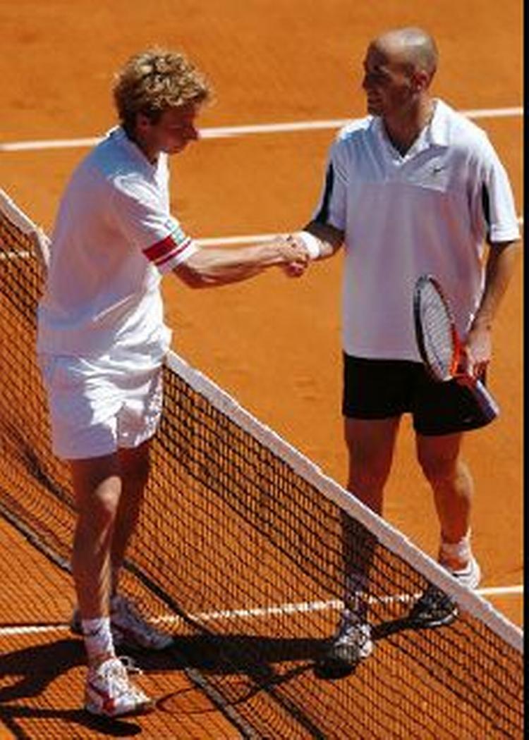 Andre Agassi ude af French Open. - Foto: AP 