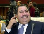 Den irakiske udenrigsminister glæder sig over FN-resolutionen, der skal give Irak suveræniteten tilbage. - Foto: AP 